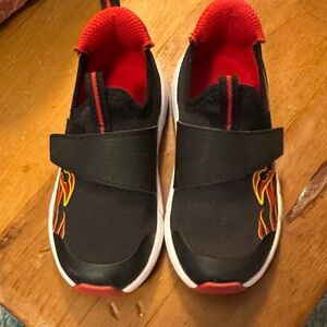 Kids Black & Red Slip-On Sneakers with Flame Accent Saucony 9
